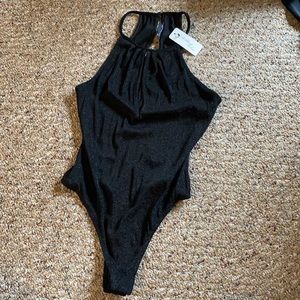 Black, sparkly body suit